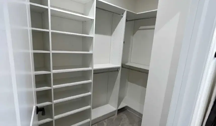 Modern reach-in closet for small spaces.