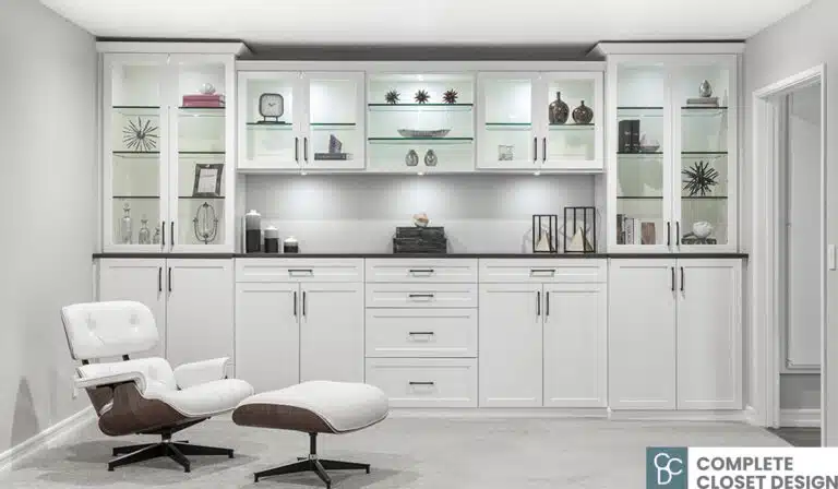 White cabinets with custom LED lighting and glass shelves. Unique space solutions by Complete Closet Design. | Closet Solutions